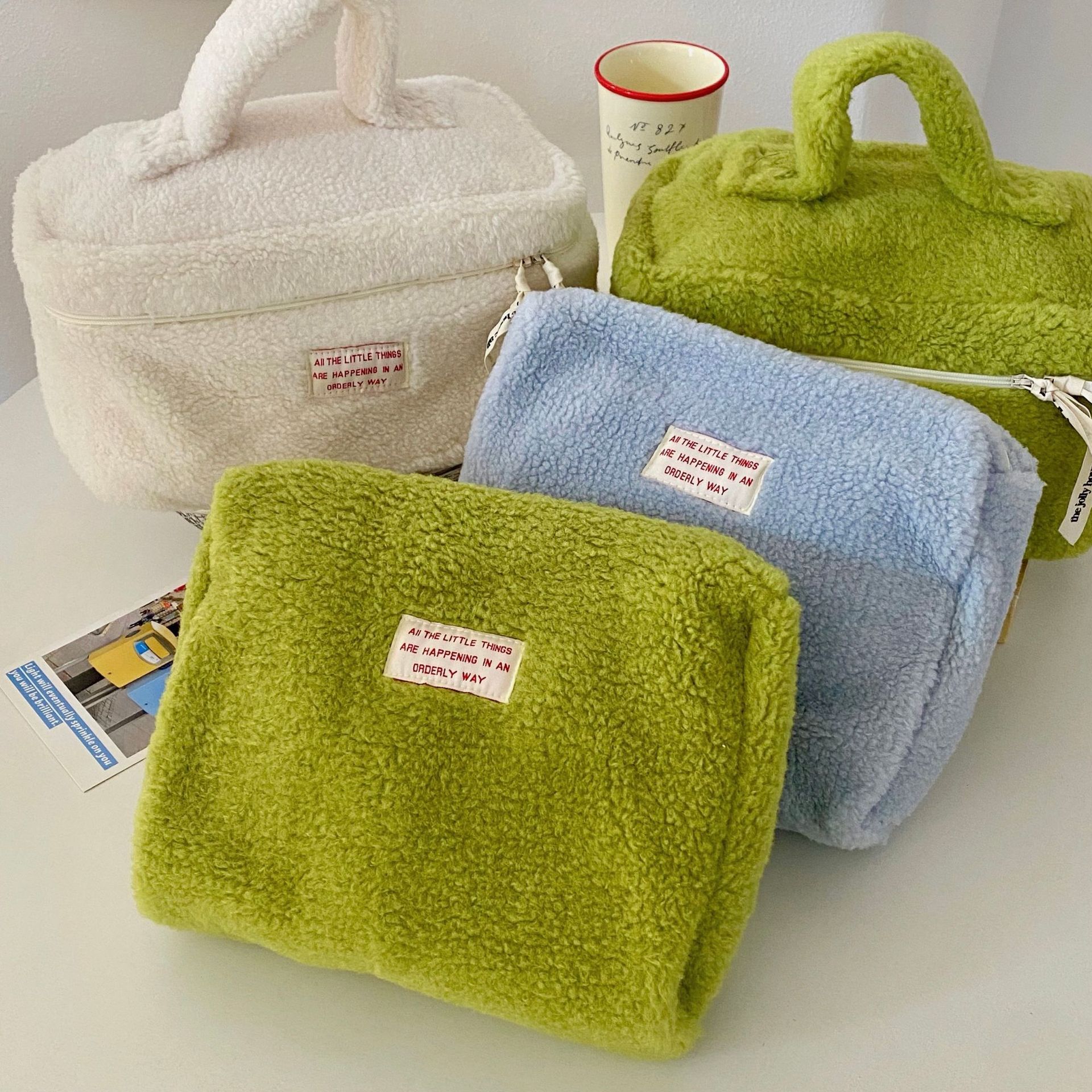 Wholesale lambskin cosmetic bags in stock, with a girlish heart, high appearance level, large capacity, portable travel storage clutch details Picture