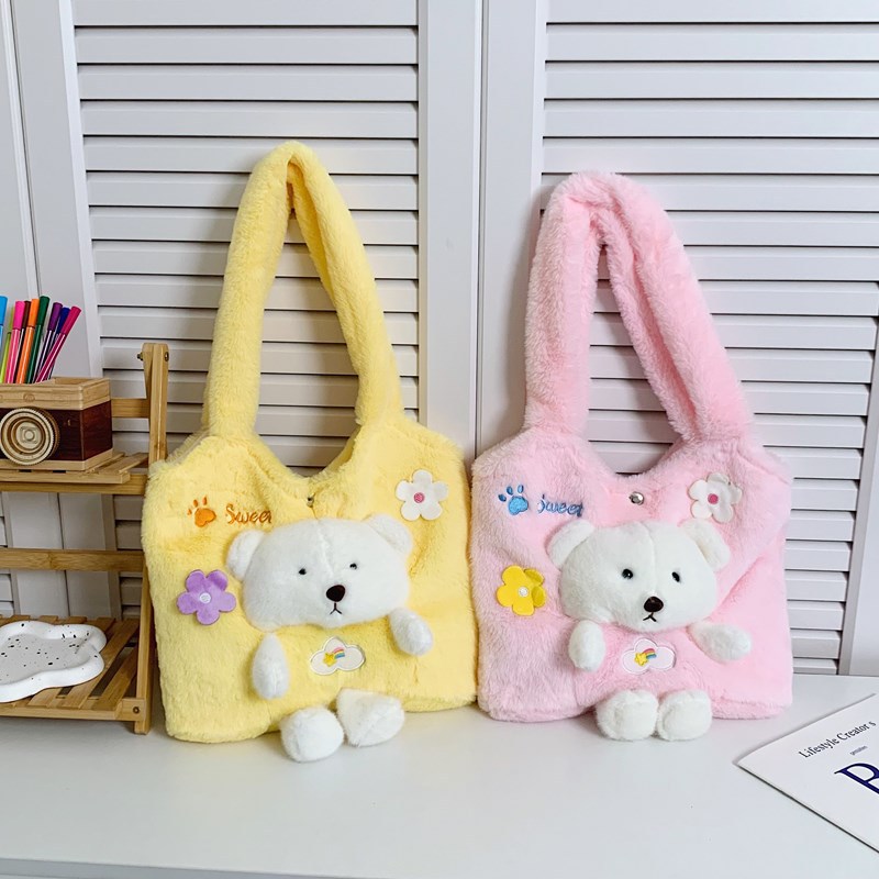 A Korean version of a fresh and cute three-dimensional bear named MAO MAO hand-carried bag with a girlish heart. A large-capacity single-shoulder storage bag for students going out full figure