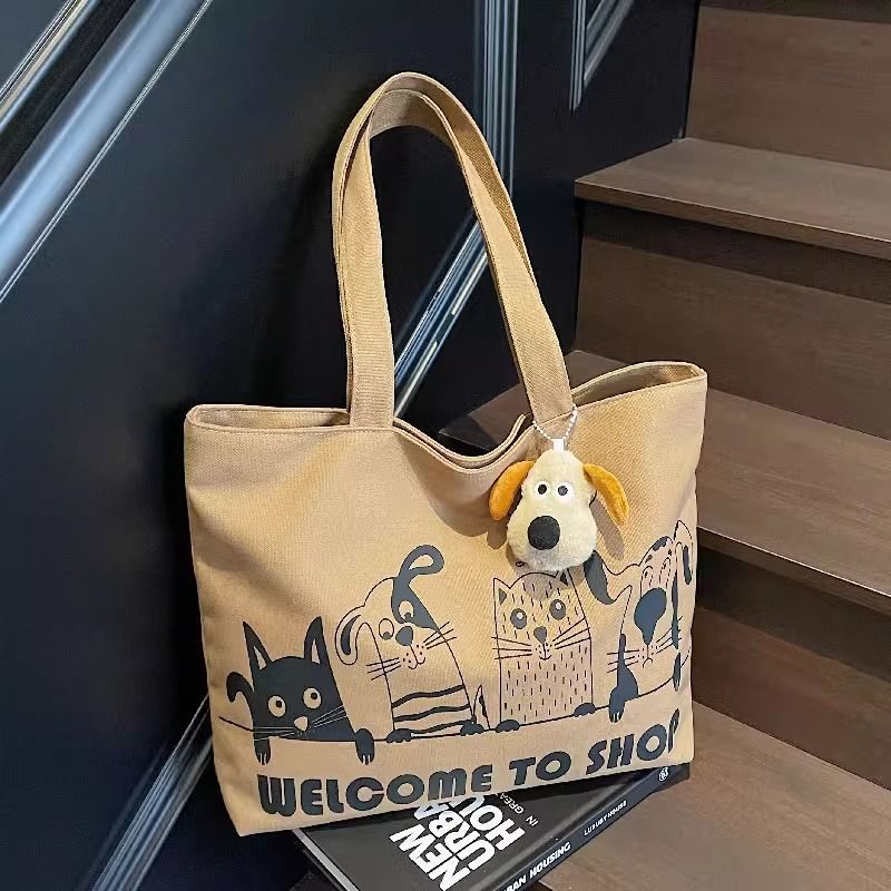 New canvas bag for women 2025, large capacity student shoulder bag, versatile cartoon tote handbag, tote commuter bag details Picture