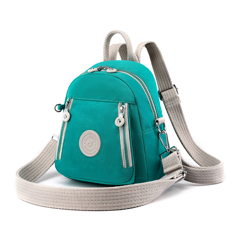 New cross-border European and American retro crossbody bag, women's multi-functional backpack with color contrast, nylon mobile phone key, coin purse Application Scenario