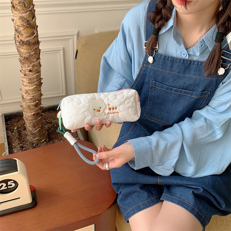 The new 34271 embroidered rabbit pen case is a cute, large-capacity student makeup bag and portable storage bag Application Scenario