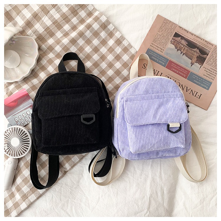 A new solid-color Japanese-style backpack for women, a Korean-style casual and versatile student schoolbag, a simple and retro trendy backpack for women Application Scenario