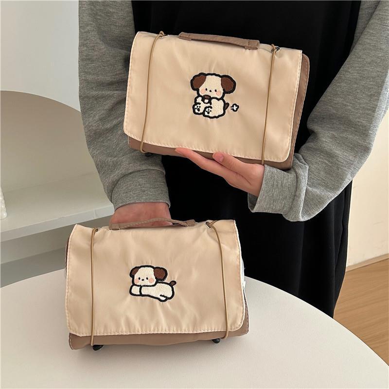 Original milk tea dog cartoon makeup bag, large capacity, high appearance level, mesh detachable storage bag, travel toiletries bag full figure