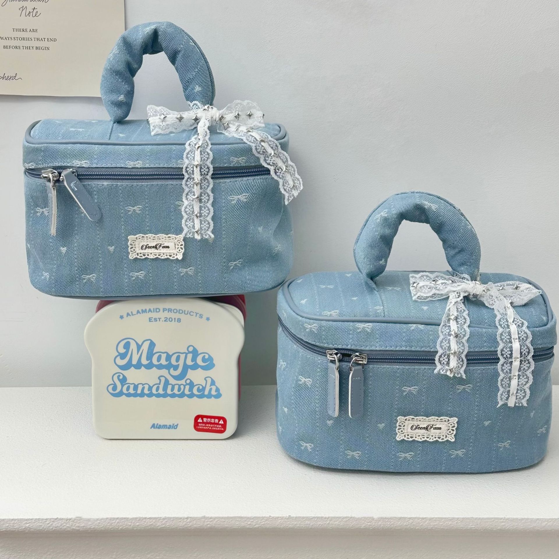 Denim lace makeup bag 2025 New style, large capacity, high-end feel, bow compartment storage bag, hand-held makeup bag details Picture
