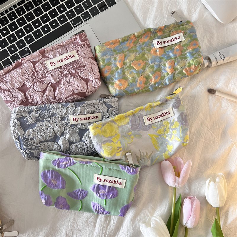 26229 set French embossed flower cosmetic bag, simple and portable handbag, casual mobile phone, walking clutch details Picture