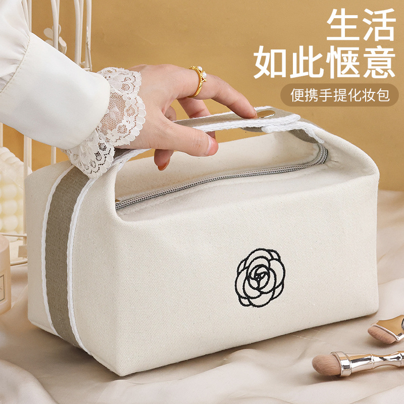 Portable canvas handbag, makeup bag, new high-end camellia lipstick, mobile phone, watch, key, travel storage details Picture