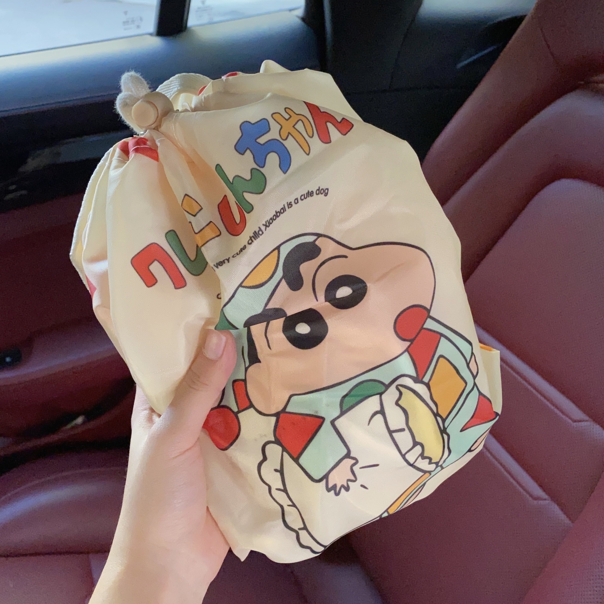 Cute cartoon car seat back storage bag, multi-functional hanging bag, large-capacity rear car storage bag, net pocket Application Scenario