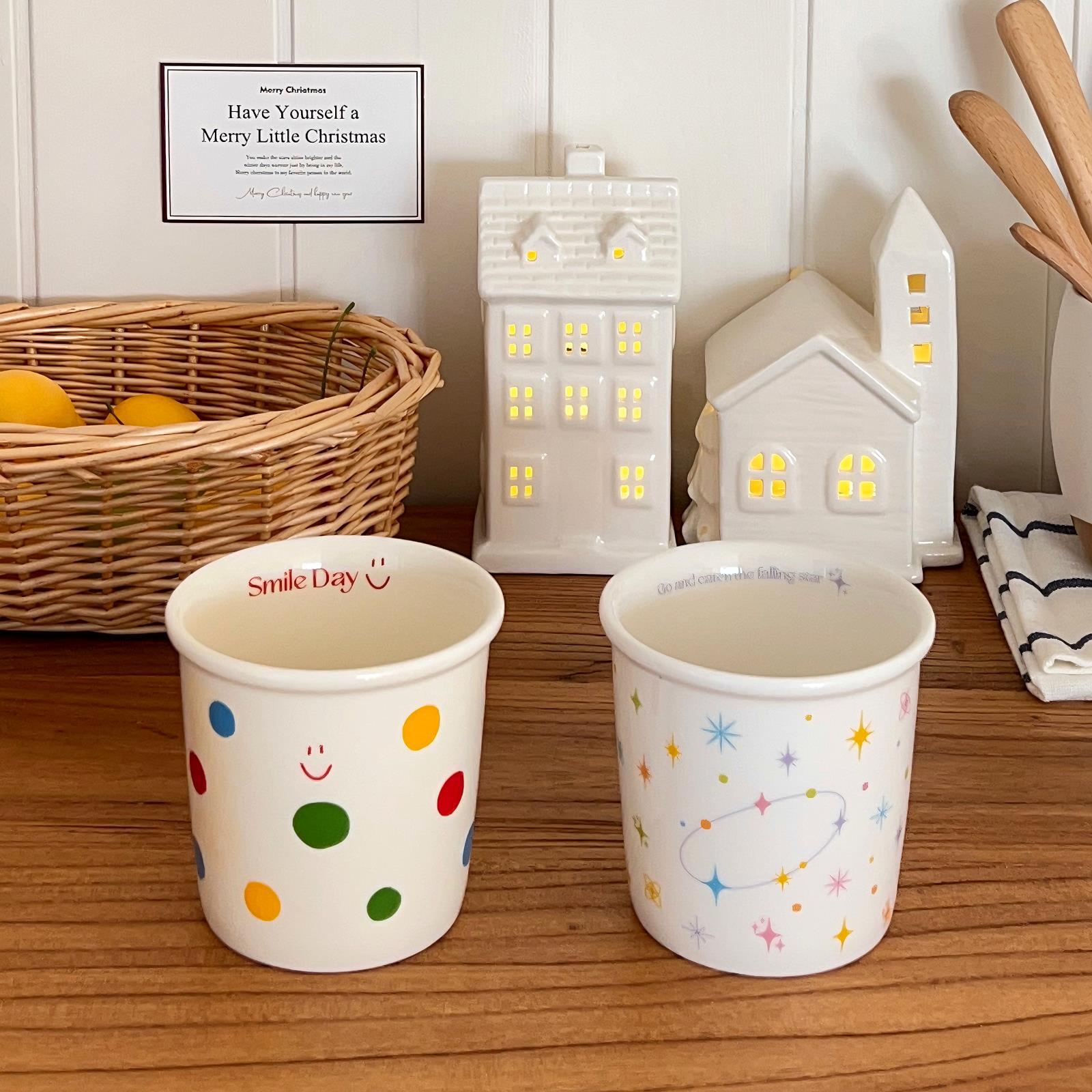 Polka dot smiling face holding a cup, cute Instagram high appearance level ceramic coffee cup, breakfast milk cup, office home cup full figure