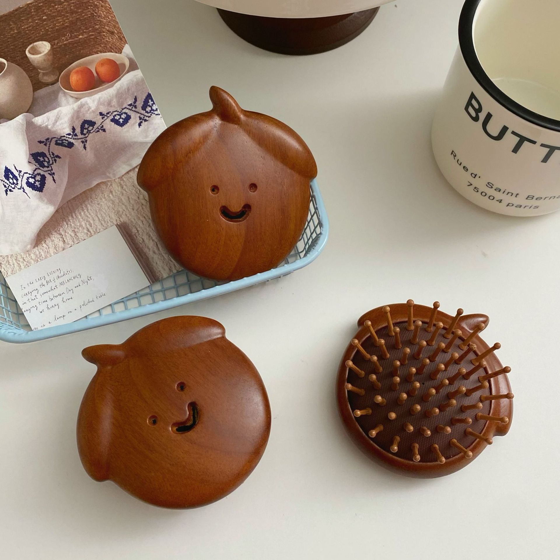 Cute smiling face sandalwood comb for women, portable airbag cushion for hair combing, skin meridian massage comb, mini round comb full figure