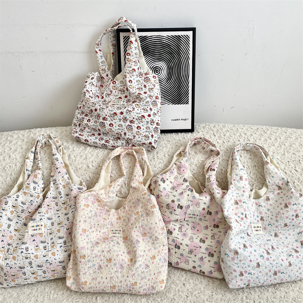 5451 [Copyrighted Edition] Embossed vest Bag, Large capacity single-shoulder handbag, daily casual, student print for girls details Picture