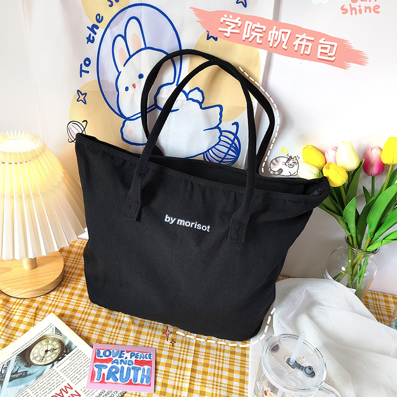 Black and white simple letter canvas bag, Korean style Instagram canvas bag, single-shoulder artistic and versatile student large capacity canvas bag full figure