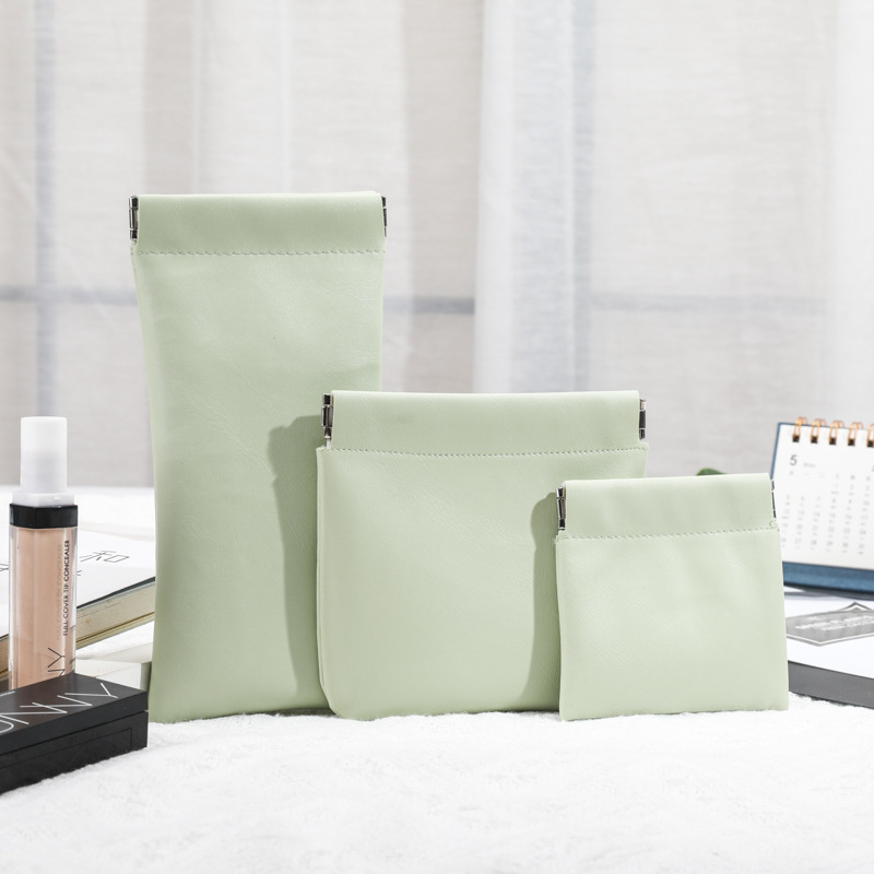 Storage bag, lipstick, makeup bag, mini charger, automatic closure, tight mouth, wired headphones, data cable details Picture
