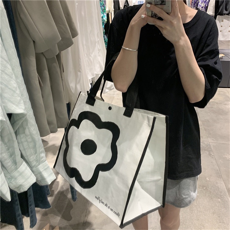 Korean minimalist ins black and white flower large-capacity hand-held shopping bag, single-shoulder large-sized eco-friendly shopping bag Item Picture