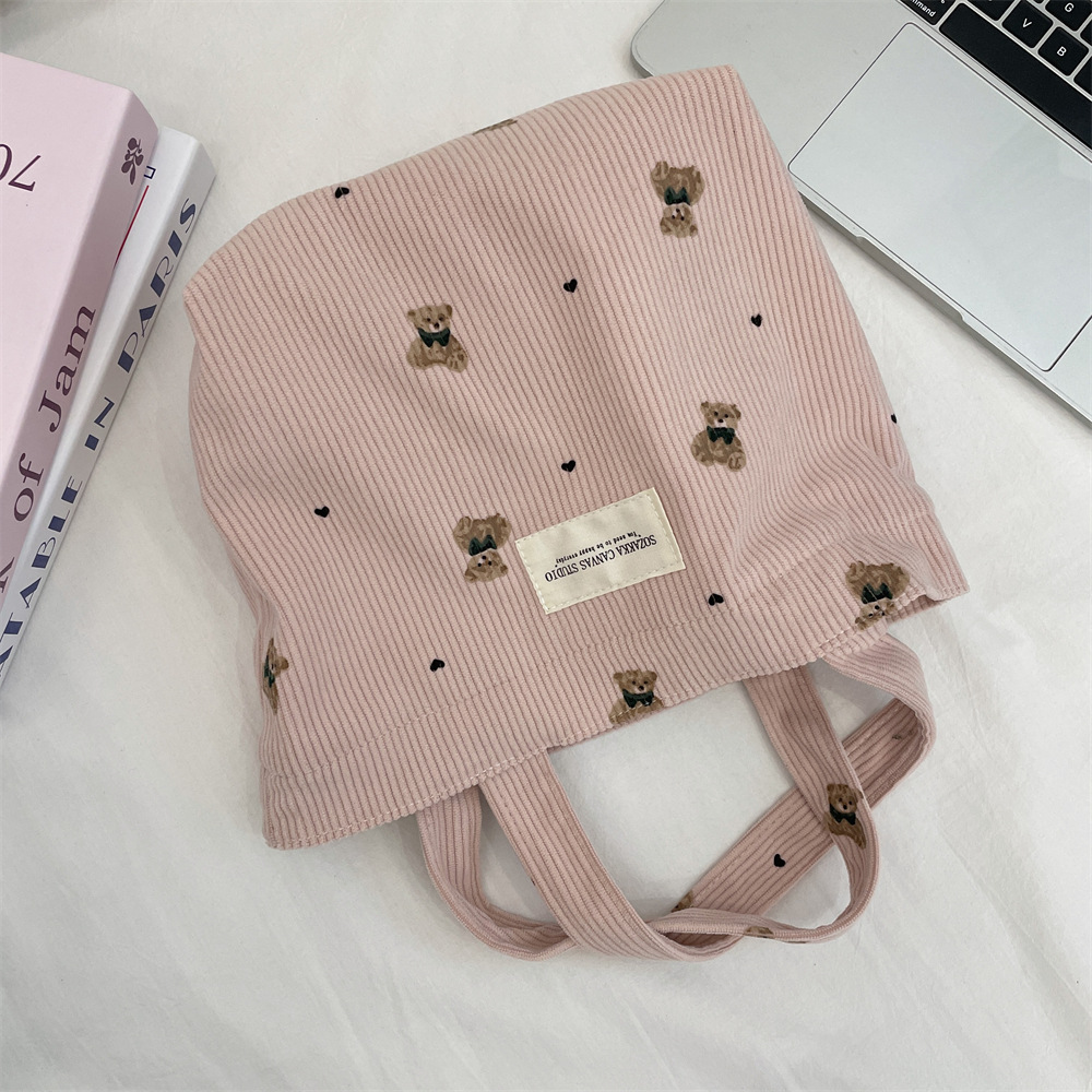 49121 copyright corduroy bear handbag, a handbag for women to carry out, a bento bag, and a small student lunch box bag details Picture