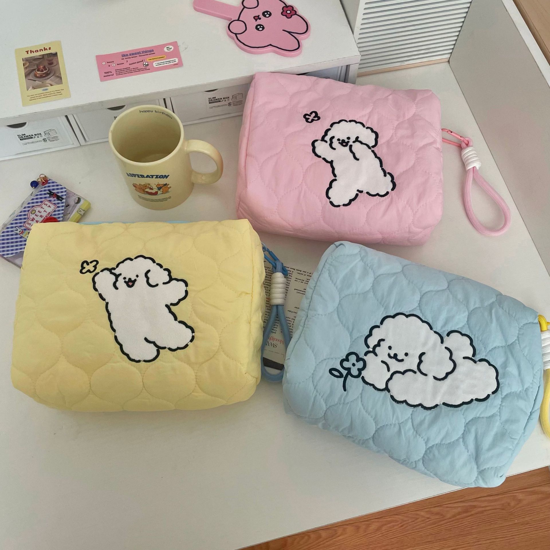 Cartoon line puppy makeup bag, women's portable large-capacity hand-carry toiletry bag, cosmetics storage bag full figure