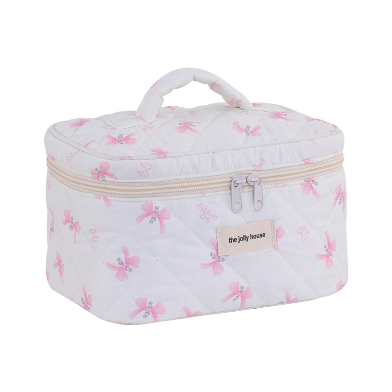 A new cross-border Amazon cream-style soft and cute bow makeup bag with large capacity and high appearance level, a girlish makeup bag Item Picture