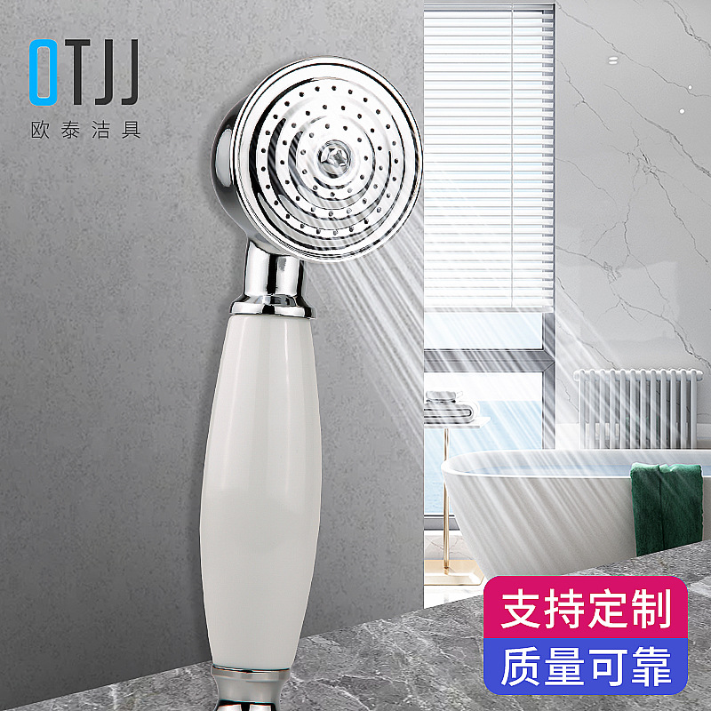 Wholesale of copper hand-spray electroplated and painted shower heads, vintage hand-held shower heads, and water heating accessories full figure