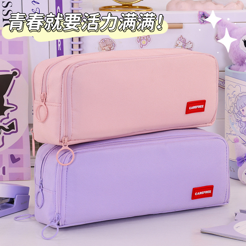 The new cross-border product features a simple yet highly attractive three-layer student multi-functional stationery box with a girl's exam pencil storage bag full figure