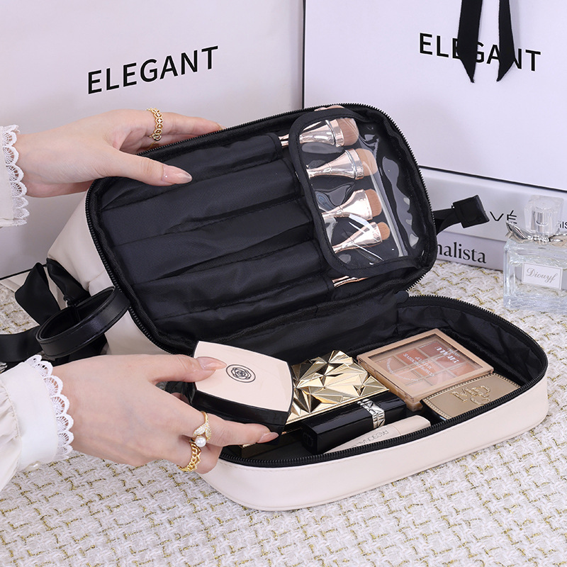 A niche, light luxury, high-appearancelevel double-layer toiletry bag, a popular bow makeup bag, and a portable travel storage bag Application Scenario