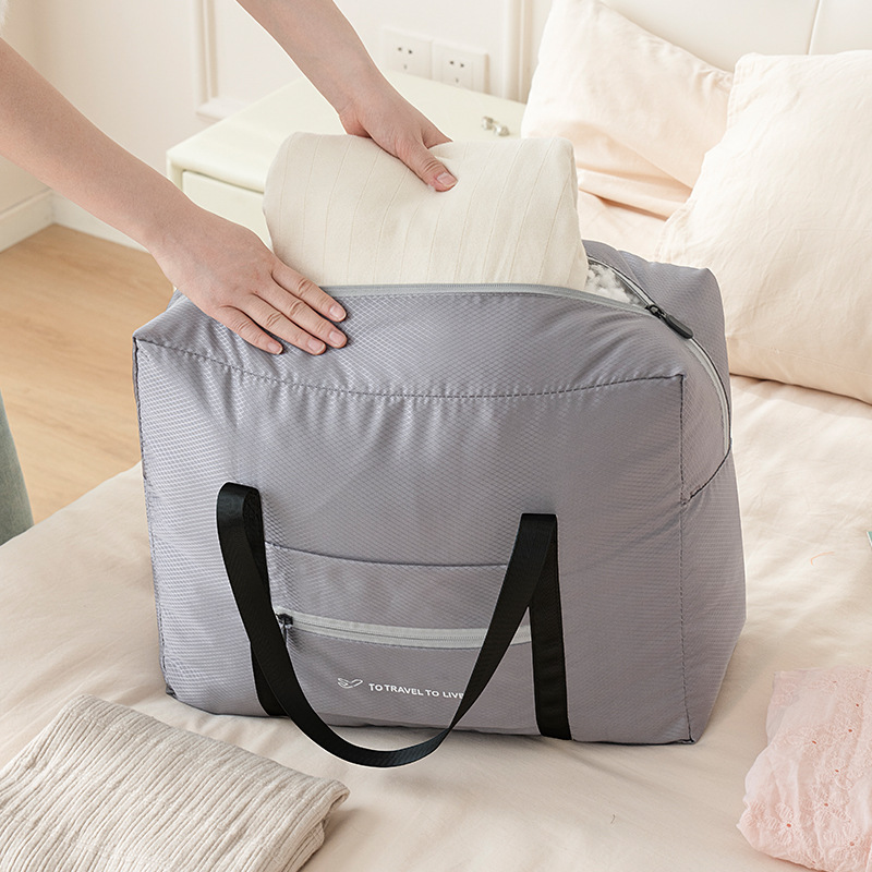 Cross-border folding travel storage bag, large-capacity business trip hand-held portable luggage bag, multi-functional diamond-shaped grid moving bag Specification drawing