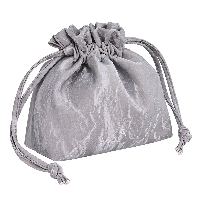 The new storage bag features a high level of French appearance, ins cosmetics, a large capacity, a drawstring opening, portability, and classic sand for the lazy Item Picture