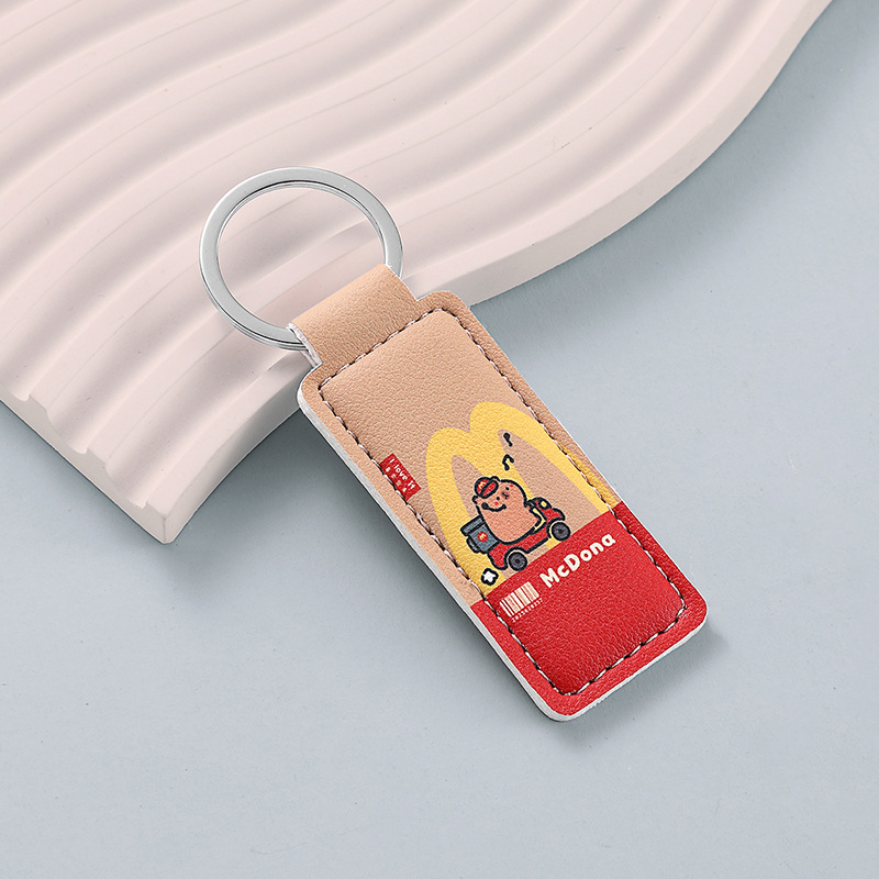 The new PU leather car keychain has a good meaning. The anti-loss keychain ring can be embossed with the logo. Leather key chain batch details Picture