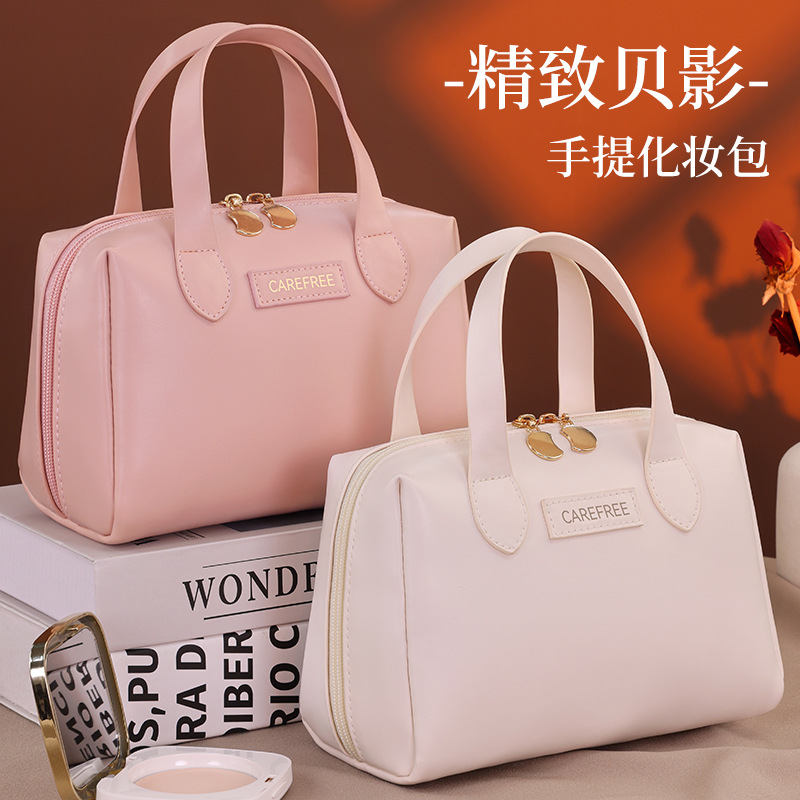 Light luxury French small-sized Beiying hand-held makeup bag, a multi-functional and high-end portable cosmetics storage bag for traveling women full figure
