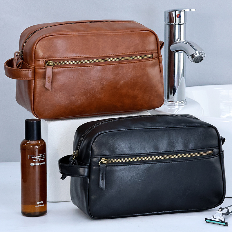 Cross-border men's pu toiletry bag with zoned storage, high appearance level, large capacity, travel portability, hand-held cosmetics storage bag full figure