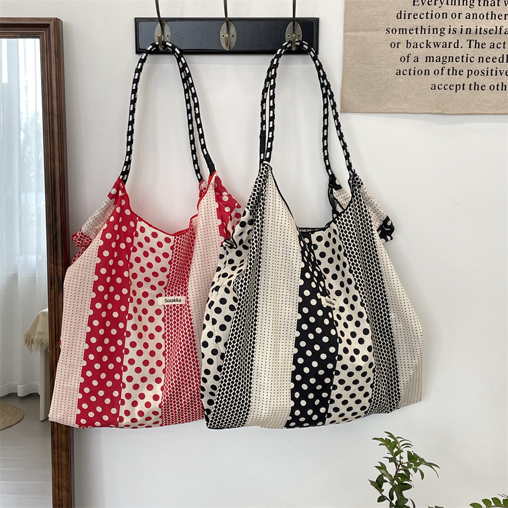 35243 Spring/Summer New French Dot Dot single-shoulder bag, large capacity canvas bag, thin student cloth bag, hand and shoulder details Picture