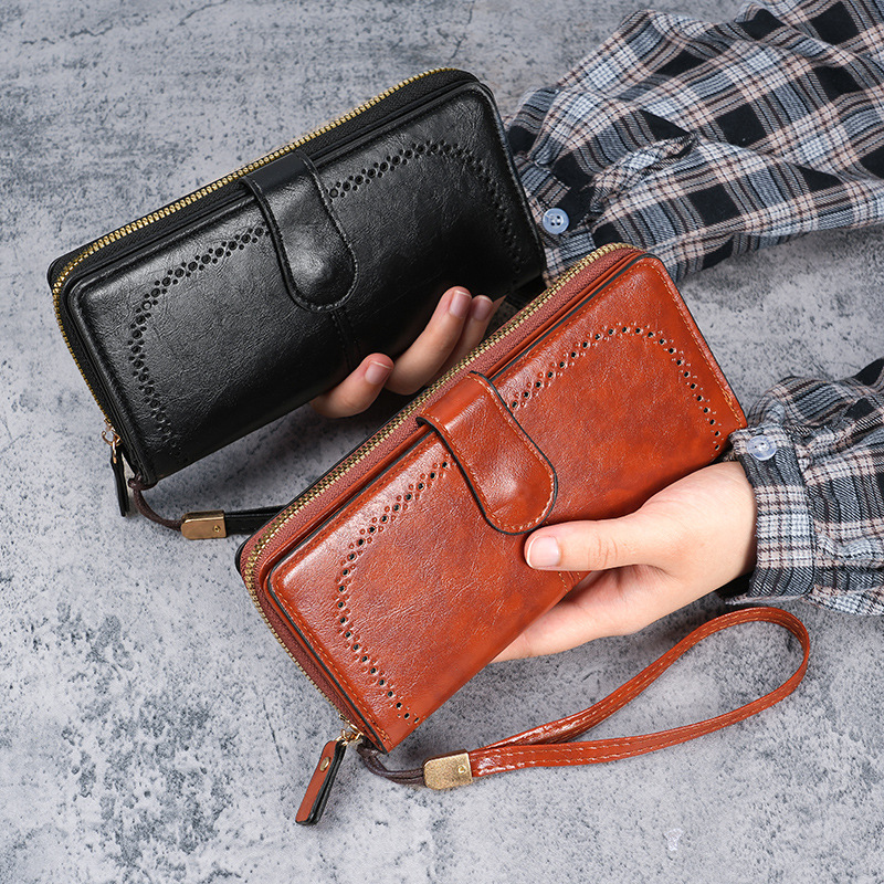 The manufacturer wholesals new fashionable oil-wax leather large-capacity wallets for women, long and large banknote holders, and hollowed-out wallets for women Application Scenario