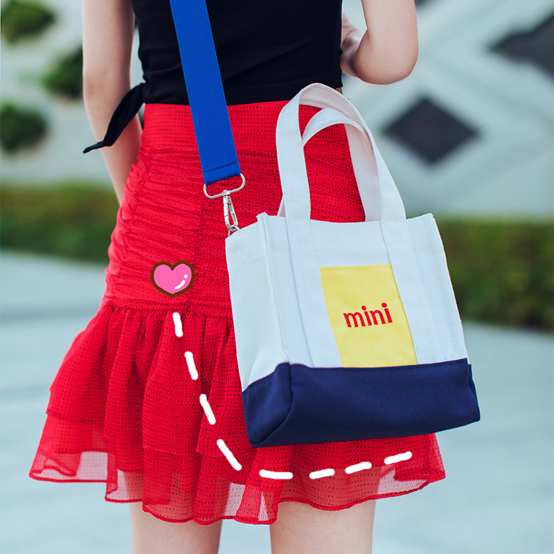 Contrasting color mini letter ins canvas single-shoulder bag, handbag, storage bag, fresh and versatile, 2021 trendy canvas bag full figure