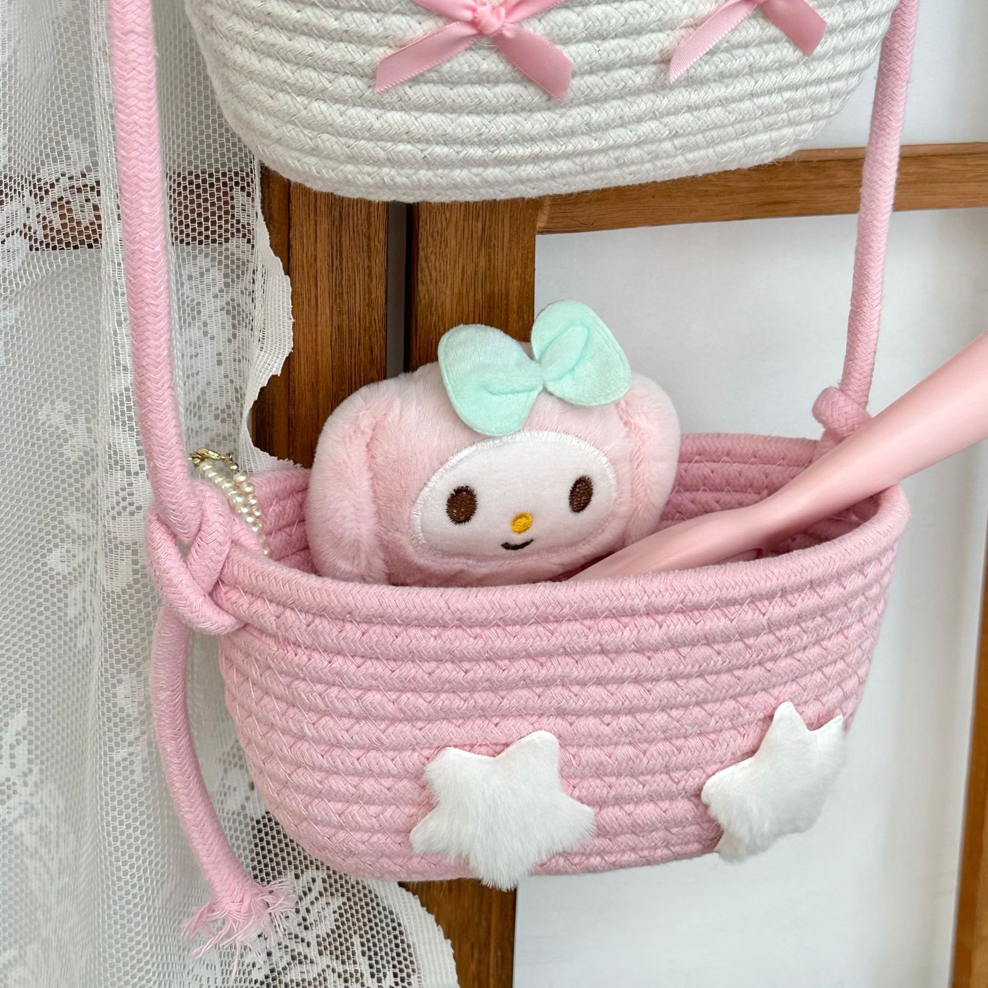 Cartoon three-layer hanging basket storage bag, three-dimensional living room entrance, organizing sundries and snacks, wall-mounted folding storage bag Application Scenario