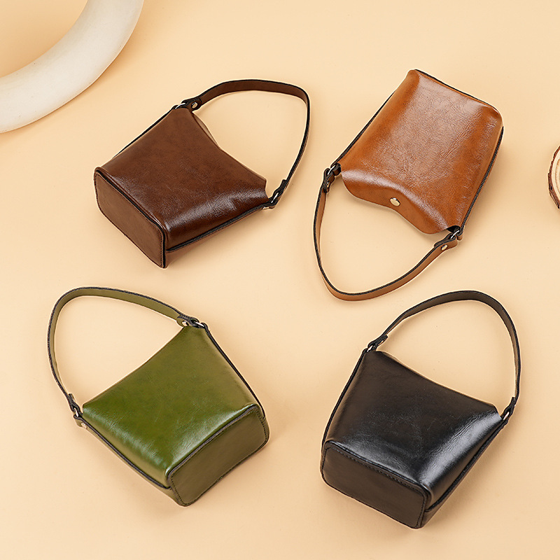 Coin purse, women's handbag, foreign trade niche bucket small bag, grocery bag, earphone bag, hand-held mini coin bag full figure