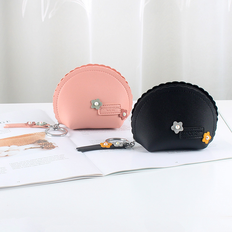 The cute girl Douyin hand-held coin purse is small and simple, featuring a coin key case with an integrated zipper and waterproof design full figure