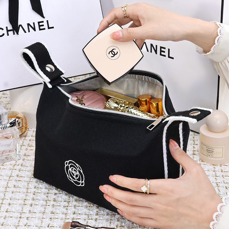 New high-end camellia portable lipstick, mobile phone, watch, key, canvas hand-held makeup bag, travel storage bag details Picture