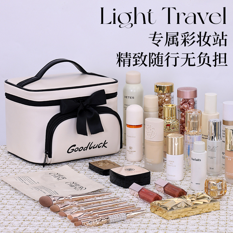 Light luxury small fragrance style, large-capacity cosmetics storage bag with compartmentalized layers, travel portable multi-functional hand-held makeup case Application Scenario