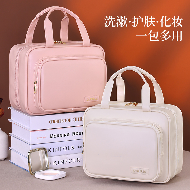 2025 New portable large-capacity hand-held makeup bag, multi-functional zoned cosmetics storage bag, travel toiletries bag full figure