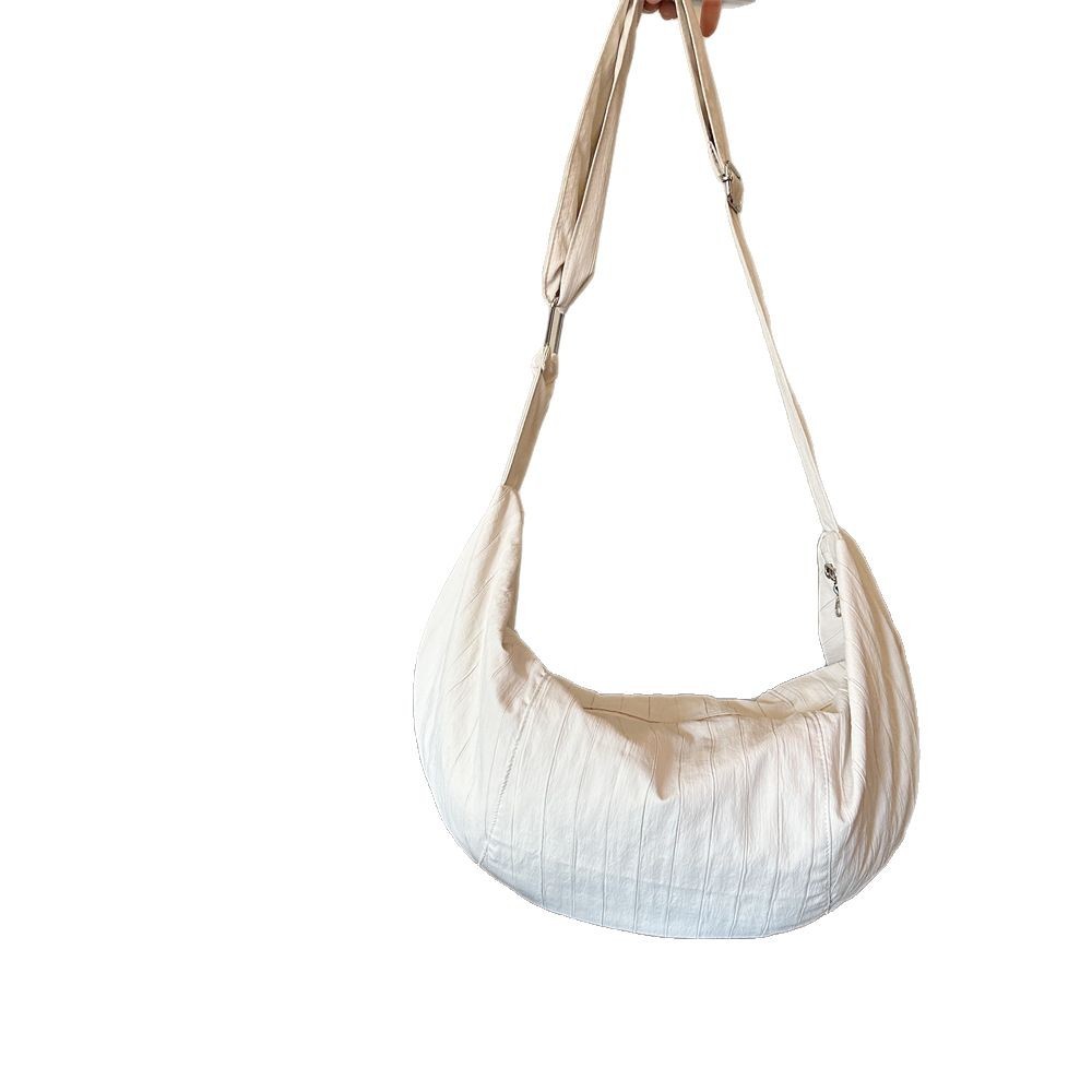 52212 Simple and niche commuter dumpling Bag, large capacity crossbody bag, ins single-shoulder bag, solid color sports underarm bag Item Picture
