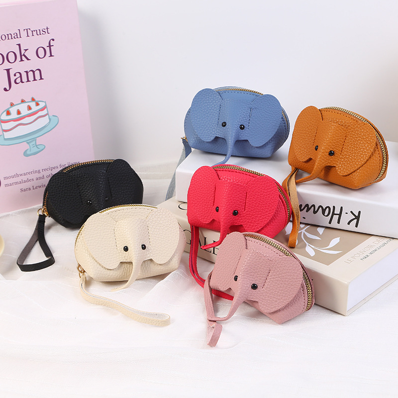 Mini Korean coin purse for women, cute and stylish in an ins style, with a high-end feel. It's small and portable with a zipper and can be carried by hand for storage full figure