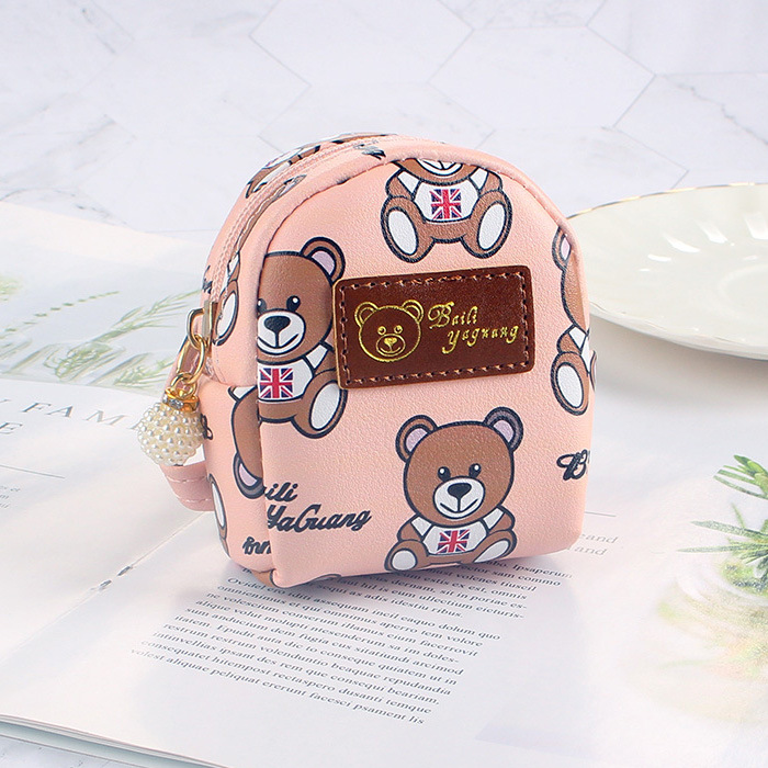 A cute little bear, small schoolbag, keychain, small hanging bag and coin purse from a Korean Instagram influencer full figure