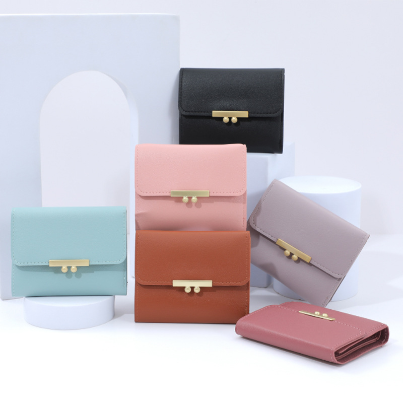 New style wallet, short and fashionable Korean hand-held bag for female junior high school students, solid color and versatile wallet, cross-border wholesale factory full figure