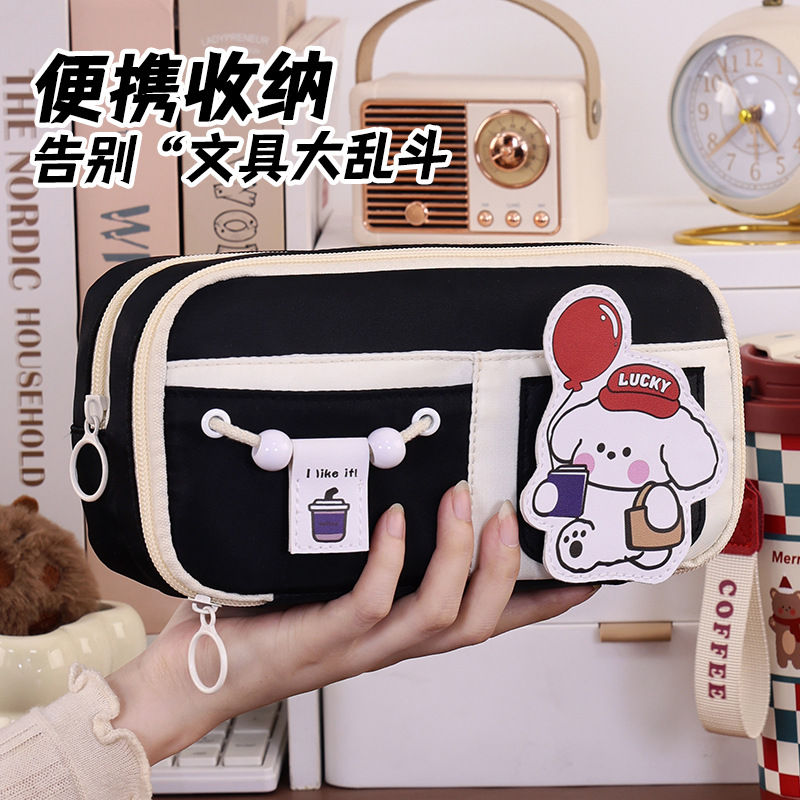 Back-to-school season children's pencil case, high appearance level, large capacity, niche, non-identical style, primary school pencil case, cartoon stationery bag Application Scenario