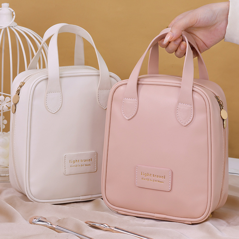 Ins-style large-capacity, high-appearance-level makeup bag, shell hand-held cosmetics storage bag, portable travel toiletries bag details Picture