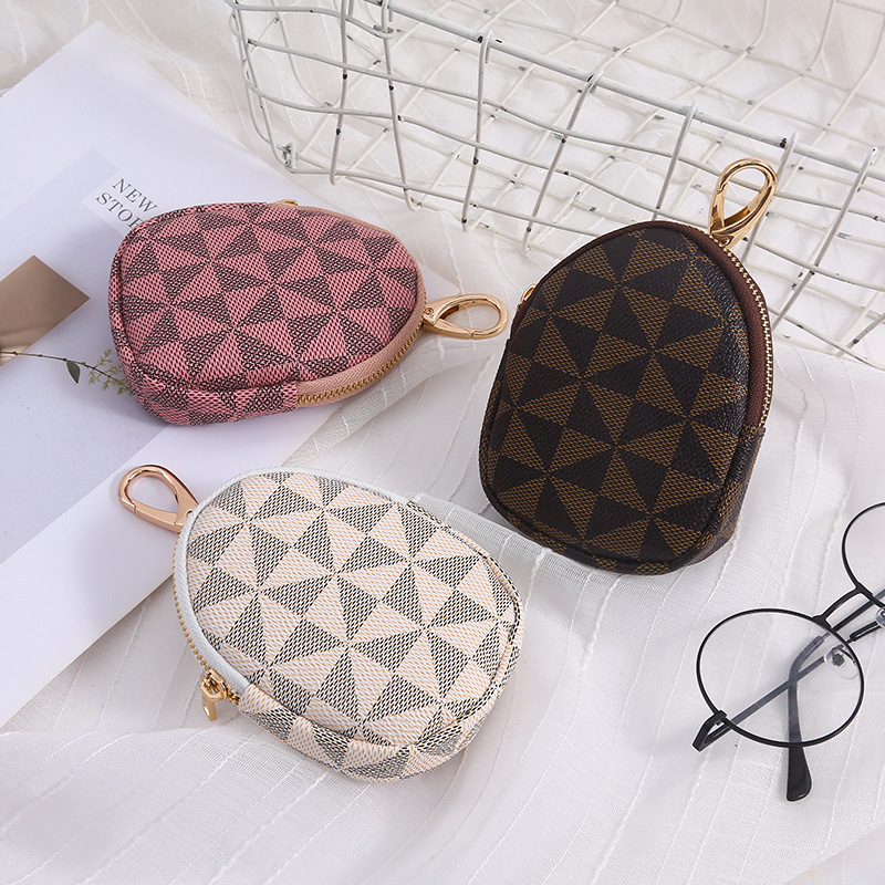 This women's coin purse features a high-end and stylish ins style, is cute and versatile, and comes with a zipper card, coin and key case for hanging full figure