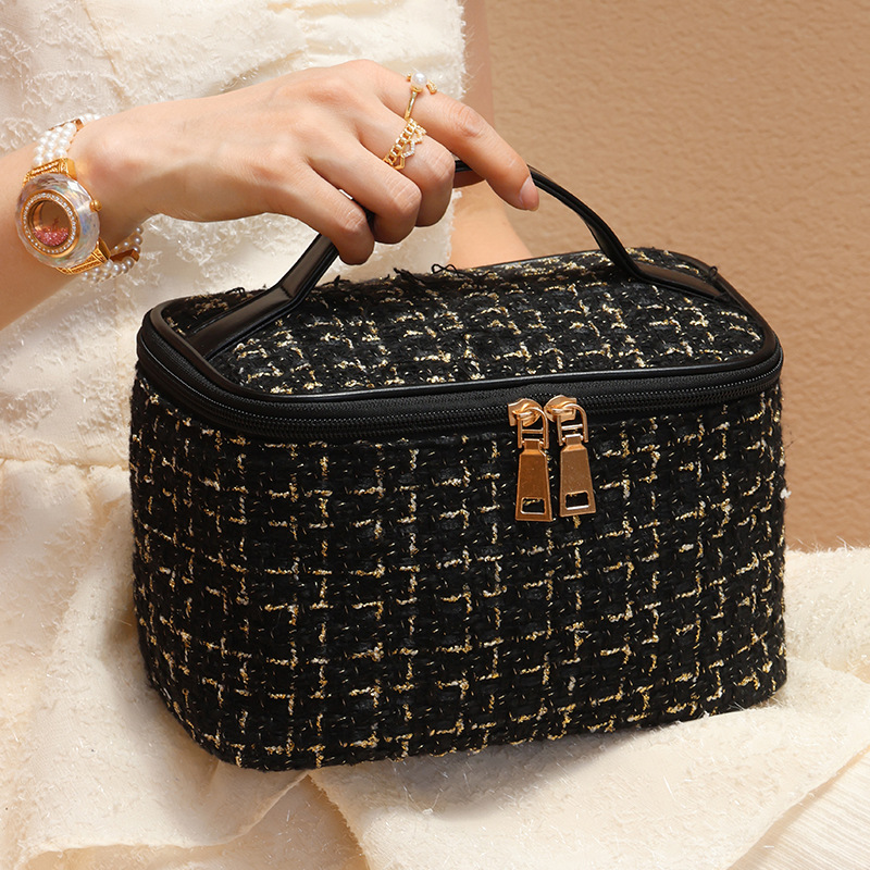 Wholesale new women's makeup bag, small chanel-style, large-capacity ins hand-held toiletries and storage bag, portable for going out, high appearance level details Picture