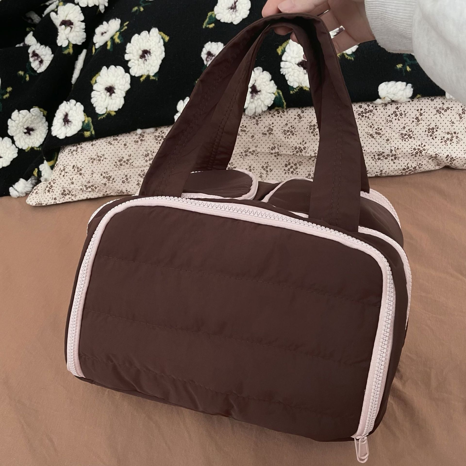 The 2025 new zoned makeup bag with a high-end feel, large capacity, double wide opening, fluffy travel portable toiletries and storage bag Application Scenario