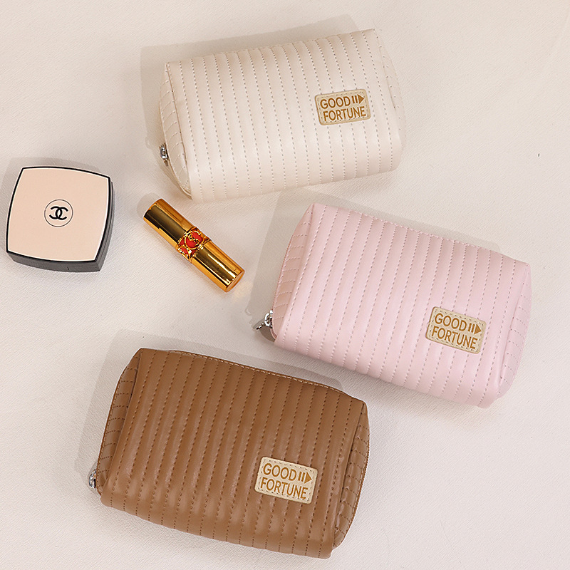 Cake makeup bag, small portable hand-held toiletry bag, cosmetics storage bag, PU portable travel storage bag full figure