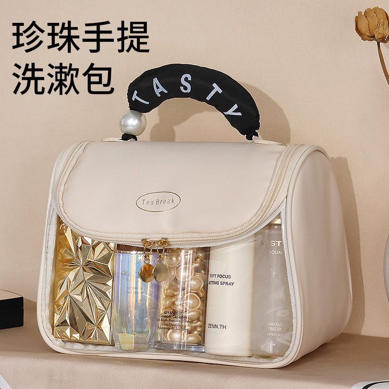 Travel hook toiletry bag, portable toiletry and makeup bag, large-capacity ladies' hand-held storage bag, toiletry and care storage bag full figure