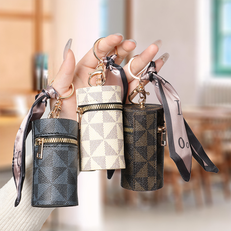 European and American classic coin purse 2024 new compact bag, pendant, earphone bag opening, red envelope, mini keychain bag details Picture