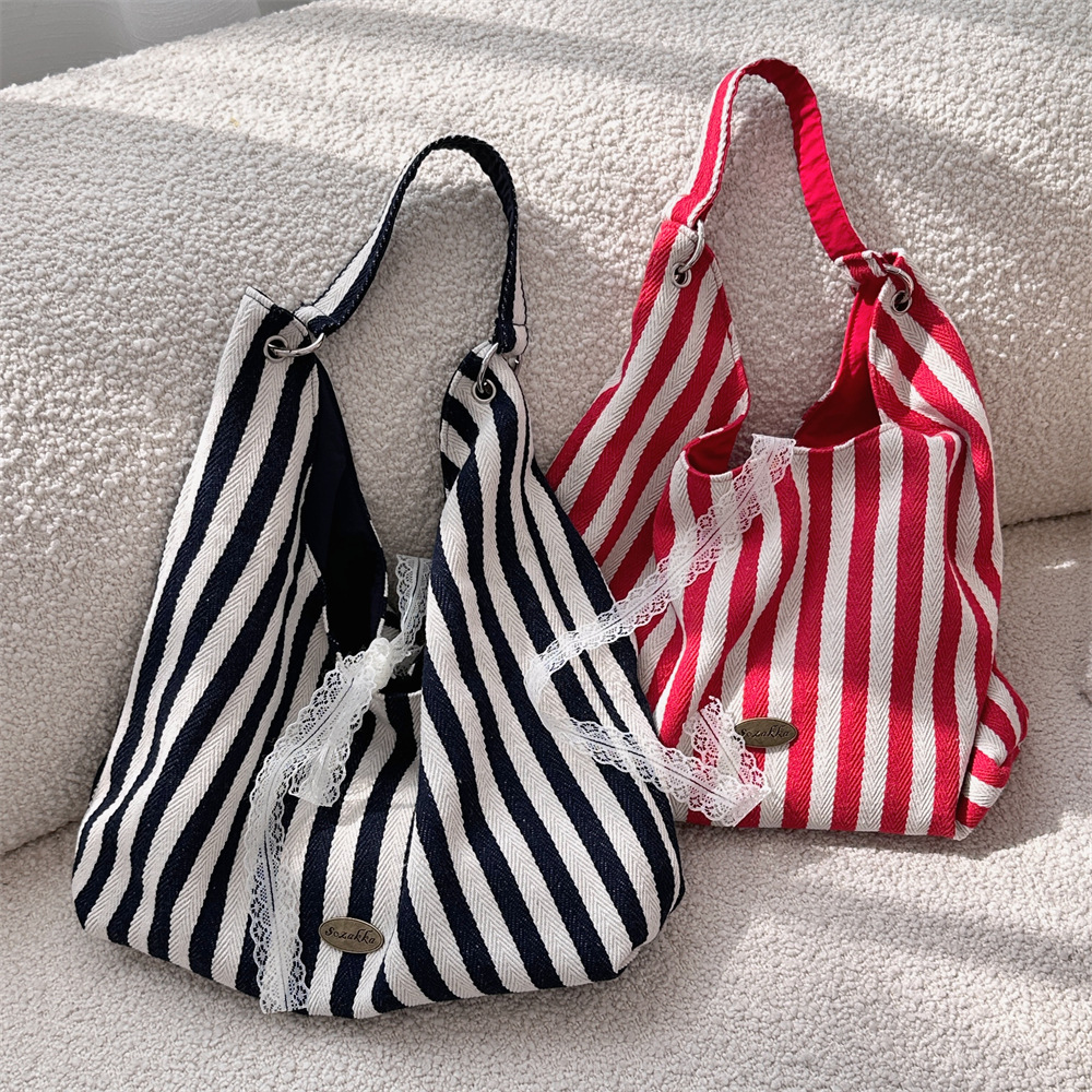48302 New vertical striped fashionable large-capacity canvas bag, InS-style simple letter commuter hand-held shoulder bag details Picture